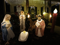 Houses and their gardens in the Celebration region in Florida are decorated with the Christmas theme on October 13. (