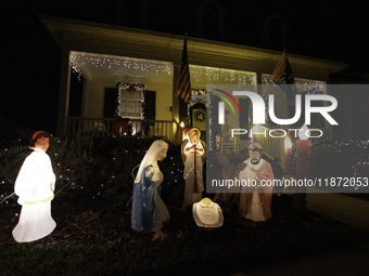 Houses and their gardens in the Celebration region in Florida are decorated with the Christmas theme on October 13. (