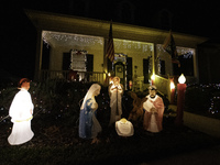 Houses and their gardens in the Celebration region in Florida are decorated with the Christmas theme on October 13. (