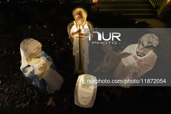 Houses and their gardens in the Celebration region in Florida are decorated with the Christmas theme on October 13. 