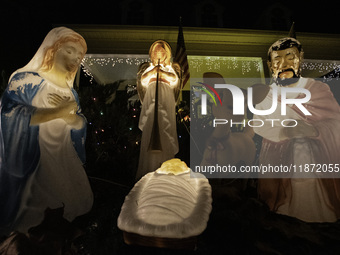 Houses and their gardens in the Celebration region in Florida are decorated with the Christmas theme on October 13. (