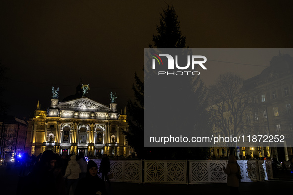 Lviv's main Christmas tree remains in darkness due to power outages caused by Russian shelling of Ukraine's energy infrastructure in Lviv, U...