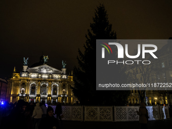 Lviv's main Christmas tree remains in darkness due to power outages caused by Russian shelling of Ukraine's energy infrastructure in Lviv, U...