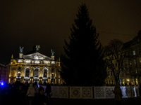 Lviv's main Christmas tree remains in darkness due to power outages caused by Russian shelling of Ukraine's energy infrastructure in Lviv, U...