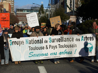 The banner of the GNSA is displayed during the protest. Between 100 and 1500 people gather in Toulouse, France, on December 15, 2024, agains...