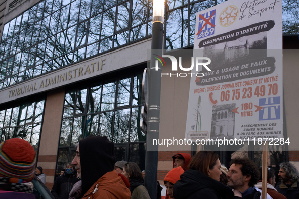 People listen to speakers in front of the Administrative Court of Toulouse. Between 100 and 1500 people gather in Toulouse, France, on Decem...