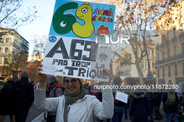 A protester holds a cardboard sign against the A69. Between 100 and 1500 people gather in Toulouse, France, on December 15, 2024, against a...