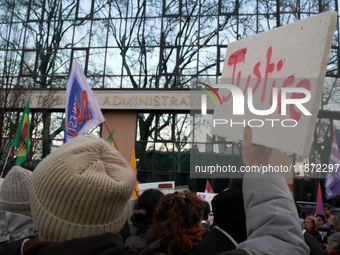 A protester holds a placard reading 'Justice' in front of the Administrative Court of Toulouse. Between 1,000 and 1,500 people gather in Tou...