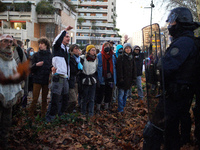 Protesters face riot police near the Administrative Court of Toulouse. Between 1,000 and 1,500 people gather in Toulouse, France, on Decembe...