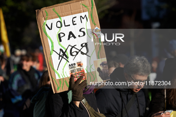 A placard reads 'We don't want the A69'. Between 100 and 1500 people gather in Toulouse, France, on December 15, 2024, against a non-adminis...