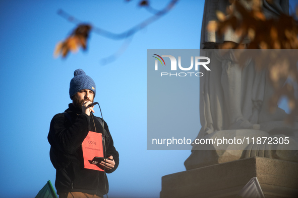 Geoffroy Tarroux, a member of LVEL, speaks before the beginning of the march. Between 100 and 1500 people gather in Toulouse, France, on Dec...