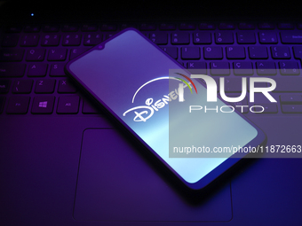 The Disney Plus logo appears on the screen of a smartphone in Reno, United States, on December 15, 2024. (