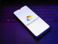 The Discovery Plus logo appears on the screen of a smartphone in Reno, United States, on December 15, 2024. (