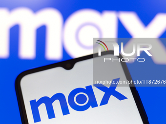 The Max logo appears on the screen of a smartphone and in the background on the computer screen in Reno, United States, on December 15, 2024...