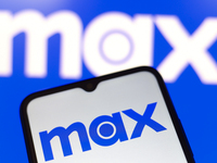 The Max logo appears on the screen of a smartphone and in the background on the computer screen in Reno, United States, on December 15, 2024...