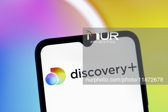 The Discovery Plus logo appears on the screen of a smartphone in Reno, United States, on December 15, 2024. 