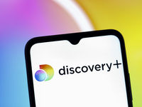 The Discovery Plus logo appears on the screen of a smartphone in Reno, United States, on December 15, 2024. (