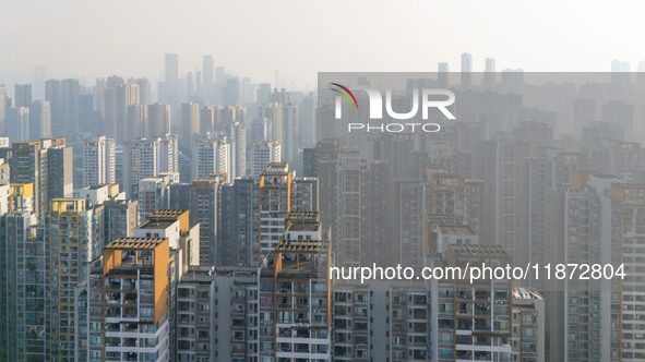 High-rise buildings are seen in downtown Chongqing, China, on December 15, 2024. 