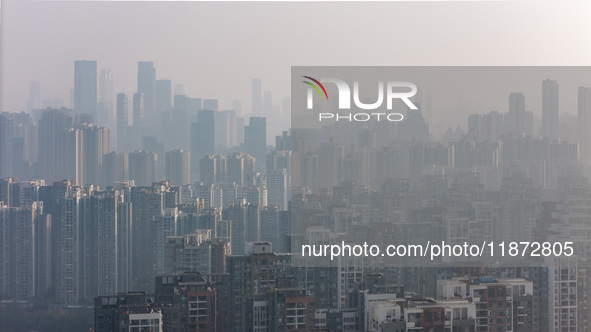 High-rise buildings are seen in downtown Chongqing, China, on December 15, 2024. 