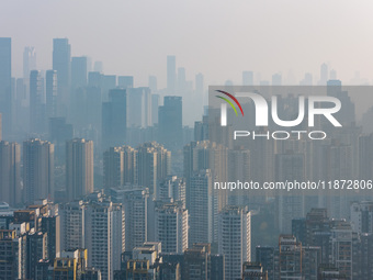 High-rise buildings are seen in downtown Chongqing, China, on December 15, 2024. (