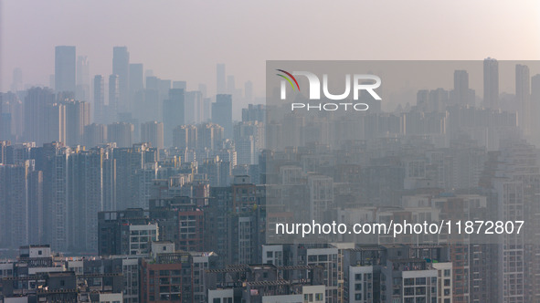 High-rise buildings are seen in downtown Chongqing, China, on December 15, 2024. 