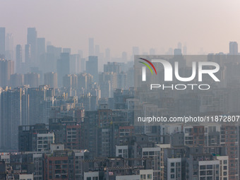 High-rise buildings are seen in downtown Chongqing, China, on December 15, 2024. (