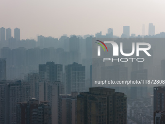 High-rise buildings are seen in downtown Chongqing, China, on December 15, 2024. (