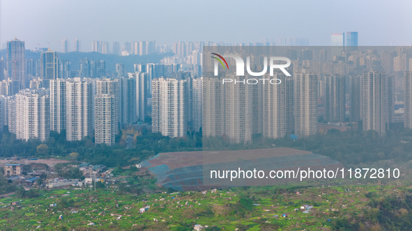 High-rise buildings are seen in downtown Chongqing, China, on December 15, 2024. 