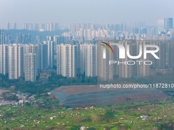 High-rise buildings are seen in downtown Chongqing, China, on December 15, 2024. (