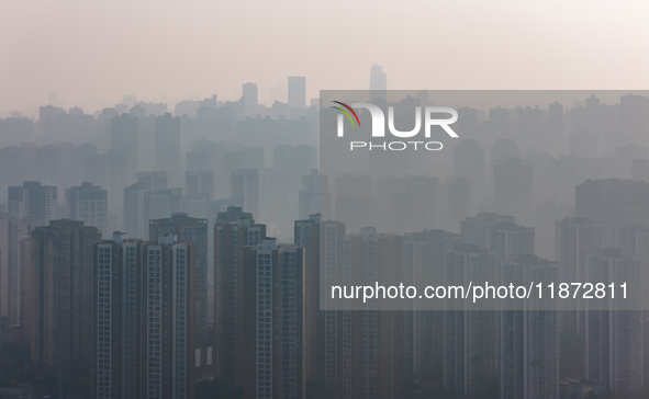 High-rise buildings are seen in downtown Chongqing, China, on December 15, 2024. 