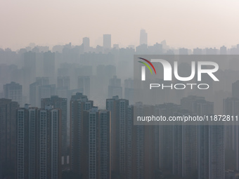 High-rise buildings are seen in downtown Chongqing, China, on December 15, 2024. (