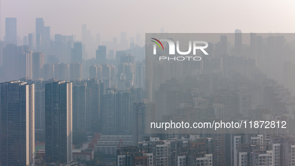 High-rise buildings are seen in downtown Chongqing, China, on December 15, 2024. 