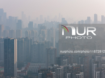 High-rise buildings are seen in downtown Chongqing, China, on December 15, 2024. (