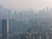 High-rise buildings are seen in downtown Chongqing, China, on December 15, 2024. (