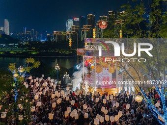 Citizens release Kongming lanterns after a New Year Lantern Festival in Chongqing, China, on December 14, 2024. (