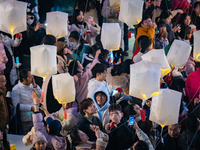 Citizens release Kongming lanterns after a New Year Lantern Festival in Chongqing, China, on December 14, 2024. (