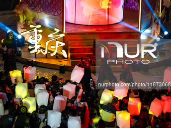 Citizens release Kongming lanterns after a New Year Lantern Festival in Chongqing, China, on December 14, 2024. (