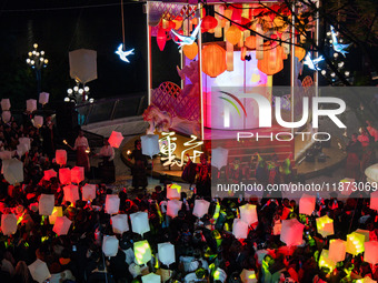 Citizens release Kongming lanterns after a New Year Lantern Festival in Chongqing, China, on December 14, 2024. (