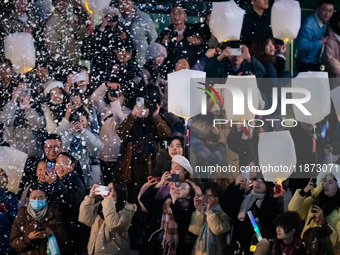 Citizens release Kongming lanterns after a New Year Lantern Festival in Chongqing, China, on December 14, 2024. (