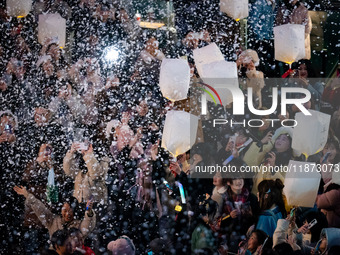 Citizens release Kongming lanterns after a New Year Lantern Festival in Chongqing, China, on December 14, 2024. (