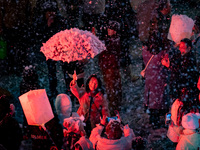 Citizens release Kongming lanterns after a New Year Lantern Festival in Chongqing, China, on December 14, 2024. (