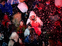 Citizens release Kongming lanterns after a New Year Lantern Festival in Chongqing, China, on December 14, 2024. (