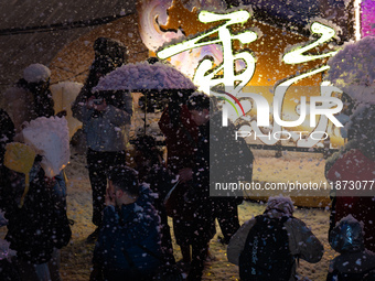 Citizens release Kongming lanterns after a New Year Lantern Festival in Chongqing, China, on December 14, 2024. (