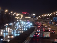 Vehicles travel along the West Fourth Ring Road at night in Beijing, China, on December 15, 2024. (