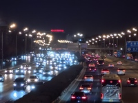 Vehicles travel along the West Fourth Ring Road at night in Beijing, China, on December 15, 2024. (