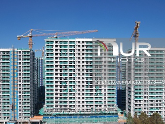 A newly built residential complex is shown in Hangzhou, China, on December 16, 2024. (