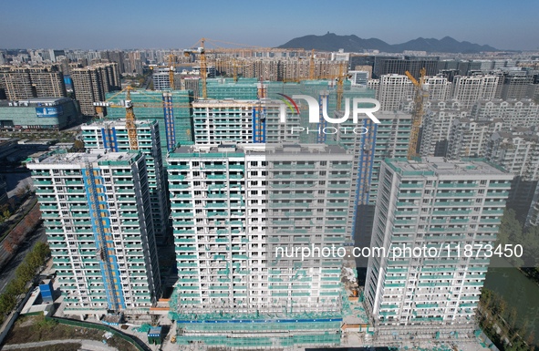 A newly built residential complex is shown in Hangzhou, China, on December 16, 2024. 