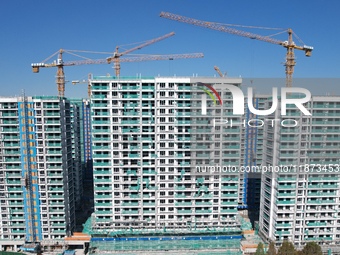 A newly built residential complex is shown in Hangzhou, China, on December 16, 2024. (