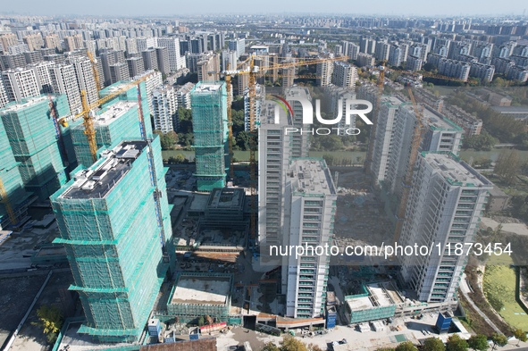 A newly built residential complex is shown in Hangzhou, China, on December 16, 2024. 