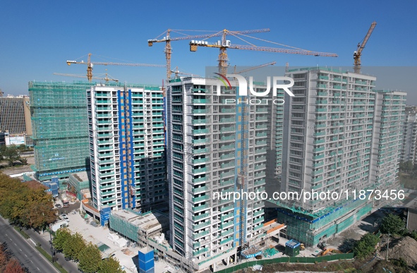 A newly built residential complex is shown in Hangzhou, China, on December 16, 2024. 